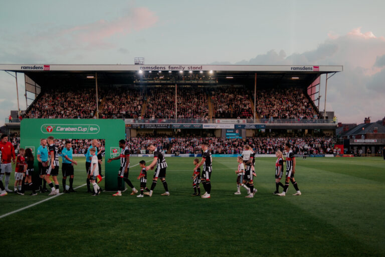 GTFC players shaking hands with Manchester Utd after the match