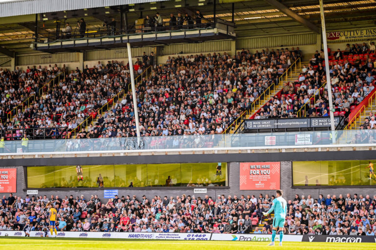 Fans in the stands at Blundell Park